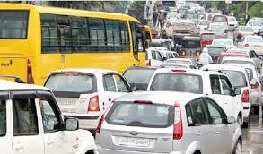 Illegal car parking by shopkeepers gives tough time to commuters