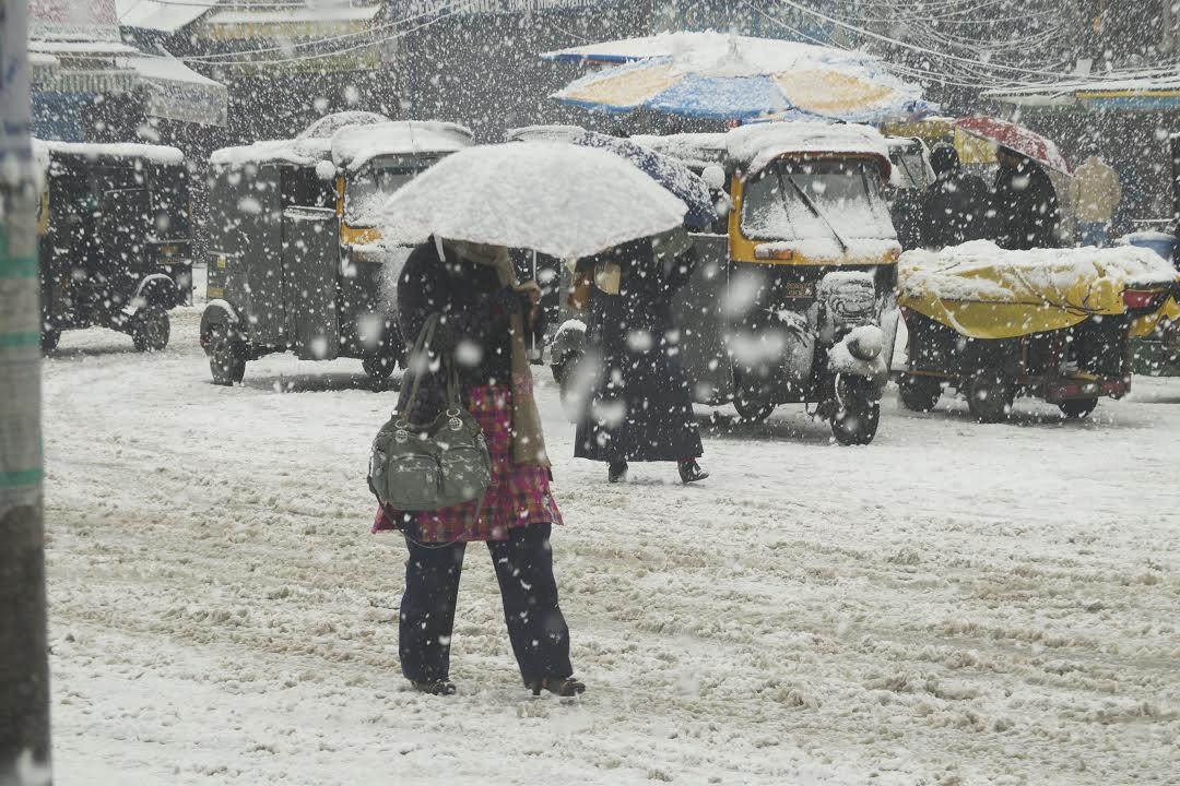 Snow brings respite from chilling cold in valley