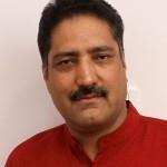 Shujaat Bukhari returns home