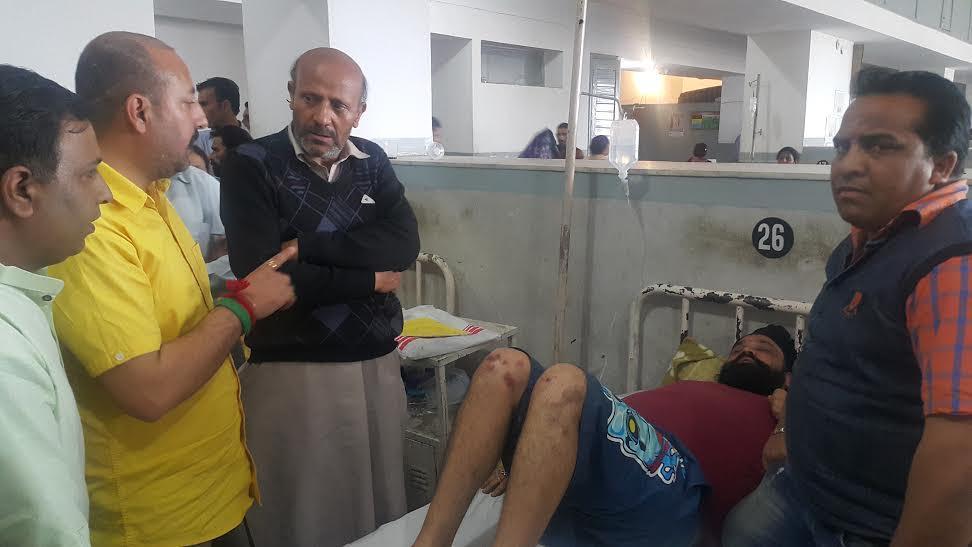 Er Rasheed visits GMC Jammu to see injured RTI activist Bipin Bakshi