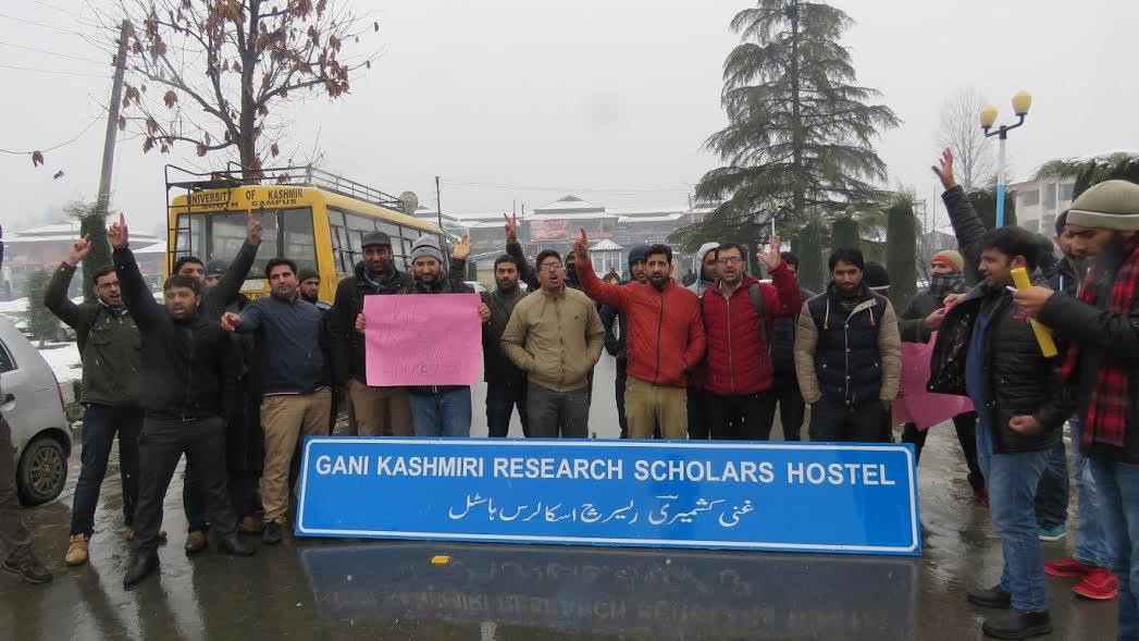 KU research scholars protest against hostel warden
