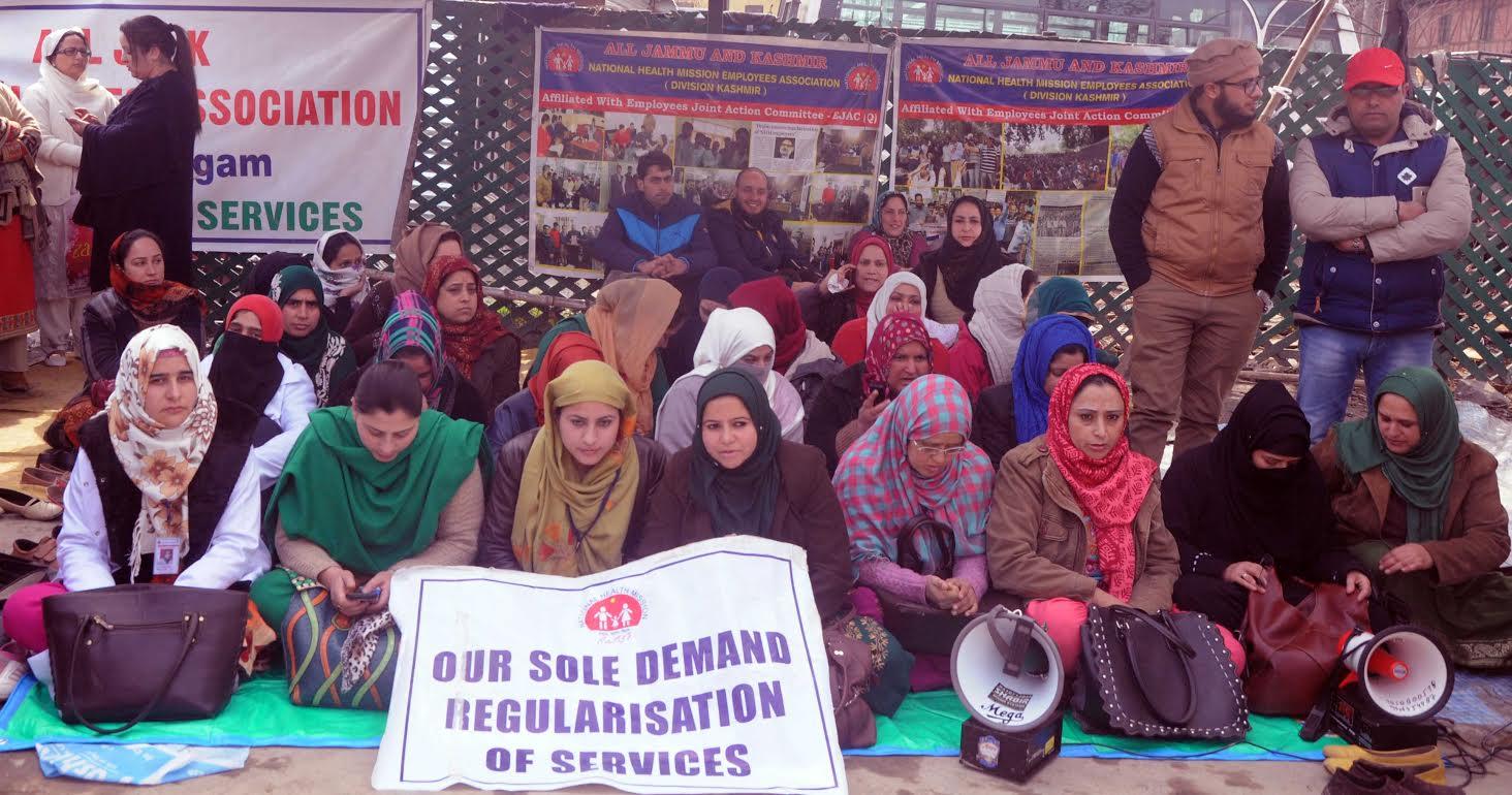 NHM Employees seek regularization, face lathis