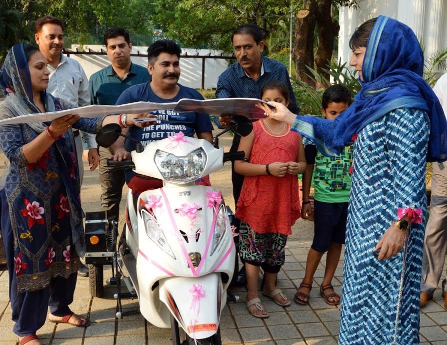 CM distributes specialized scooter to a differently-abled youth
