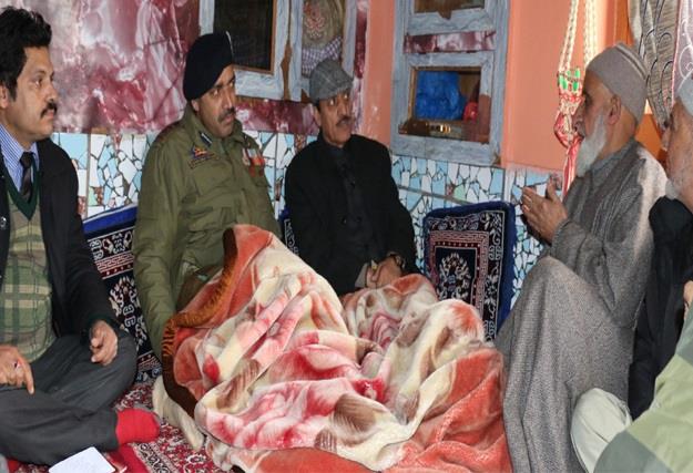 Abdul Haq visits families of slain soldiers in Kupwara