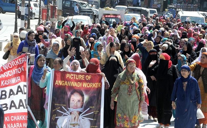 Anganwadi workers block road to press for their demands