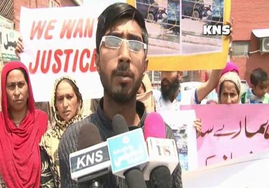 Family of Adil Yaddo protests in Srinagar