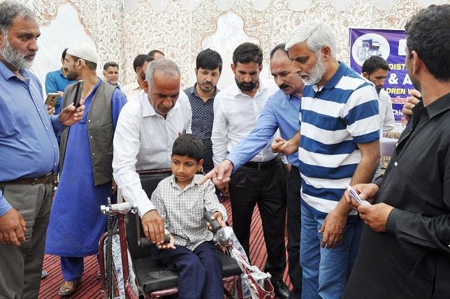 Aid, appliances distributed among differently-abled children in Pulwama