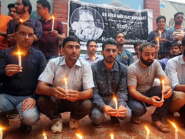 Journalists organise candlelight vigil to mourn Bukhari's assassination