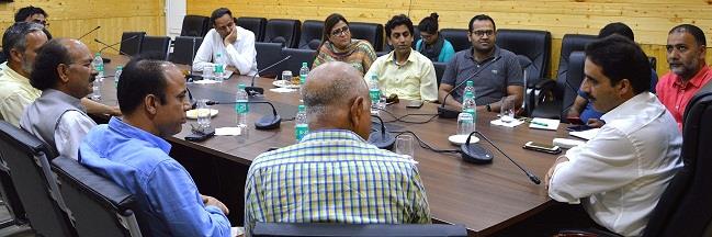 Director Information interacts with media owners, editors, journalists