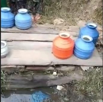 Crying for portable water, the Lahikoot villagers keep water preserve in a well locked for days