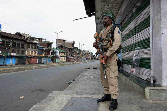 Shutdown, curfew ahead of hearing on Article 35-A cripples normal life across Kashmir