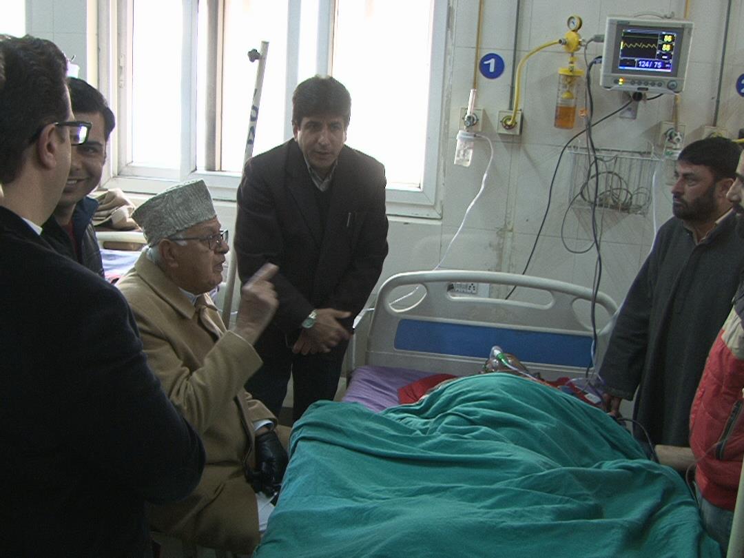 Dr. Farooq visits Muhammad Ismail Wani at SMHS Hospital