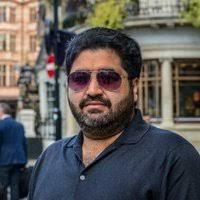 Irfan Ansari greets people on Shab-e-Mehraj