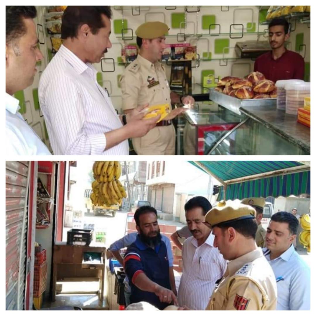 Srinagar police conducts market checking in Nowgam, Lalbazar areas