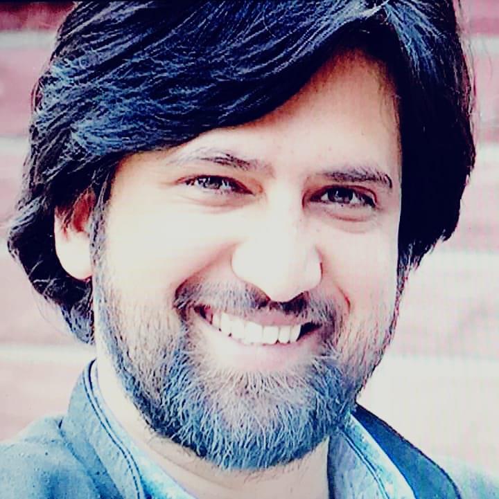Political activist, Touseef Raina greets people on Kheer Bhawani Mela