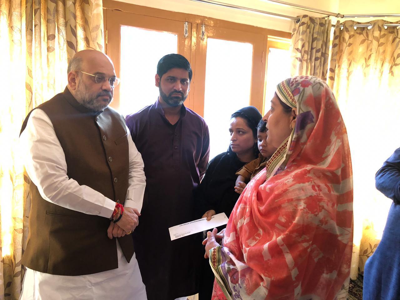 Amit Shah visits Srinagar residence of slain SHO Arshid Khan
