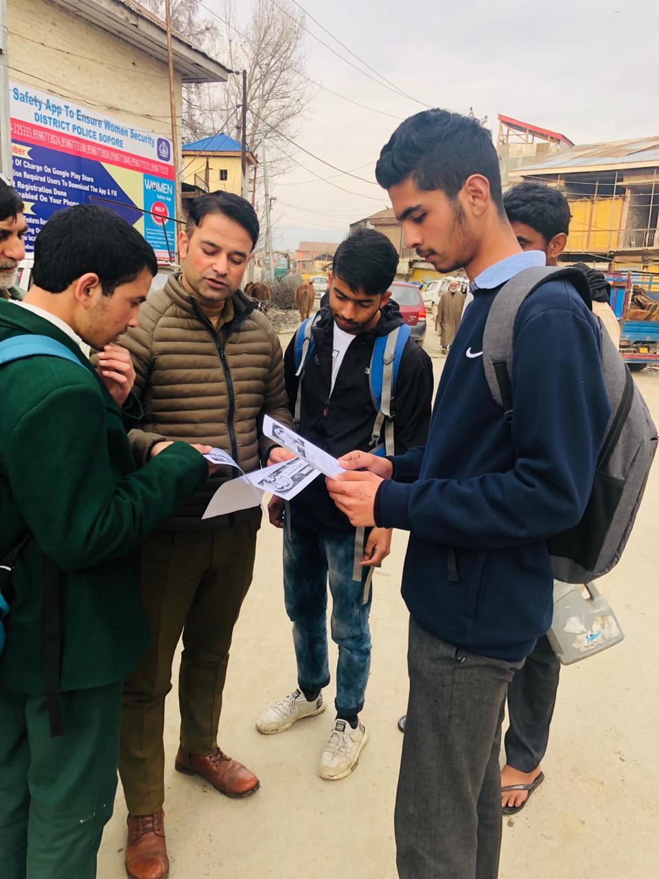 Sopore Police distributed pamphlets carrying information about Novel corona virus