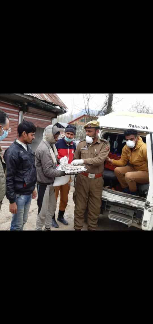 BDC Chairman Langate along with DO PP Chogal distribute food items to needy in Yunsu