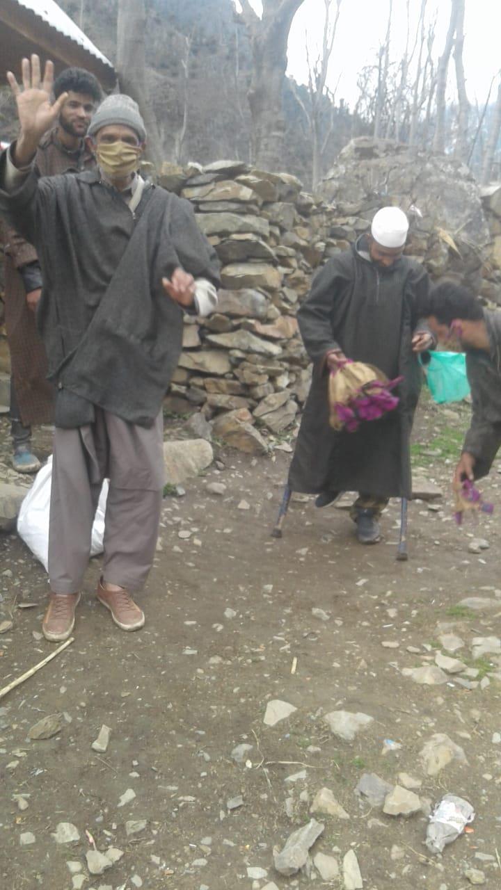 Physically challeneged tailor distribute masks among the masses in Tral village