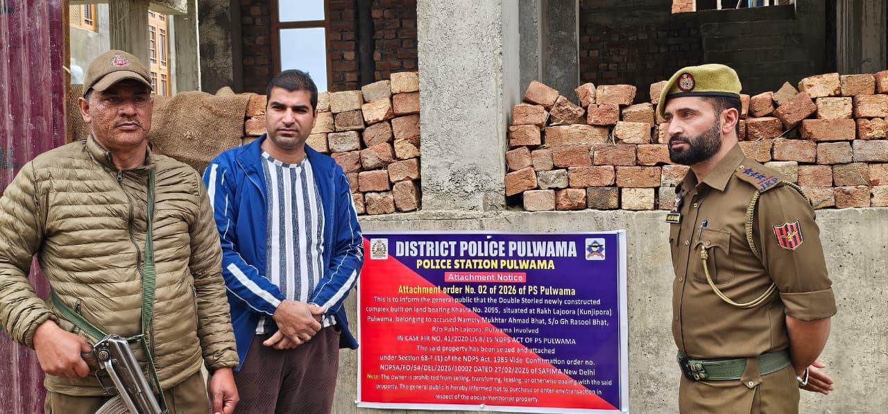 Pulwama Police Attach Properties of Notorious Drug Peddler in Kunjipora Village