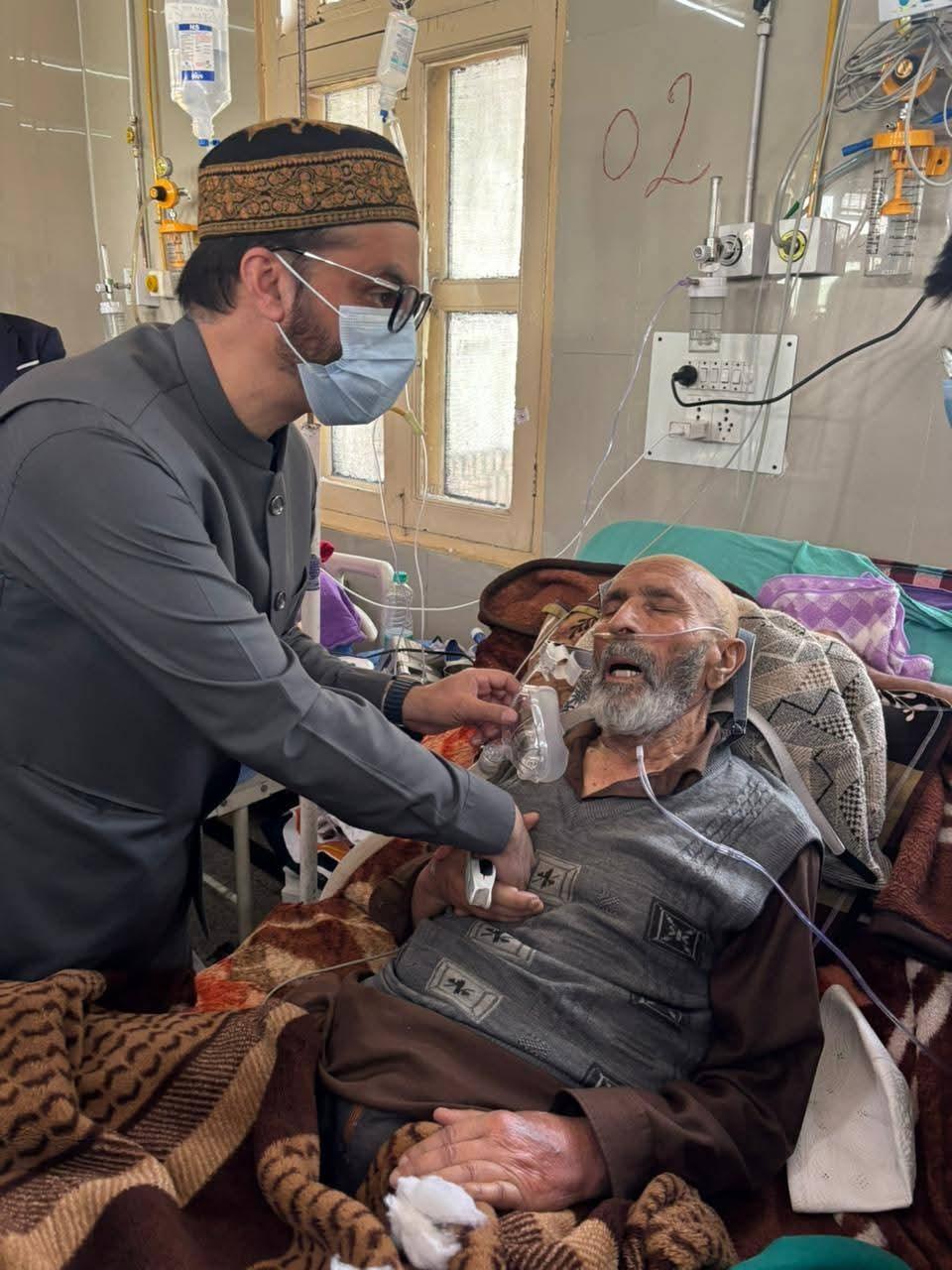 Mirwaiz visits ailing father of MP Er. Rashid at SMHS hospital