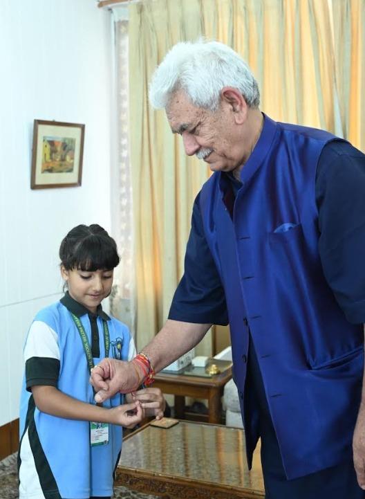 Lieutenant Governor Celebrates Raksha Bandhan with students from DPS Baramulla